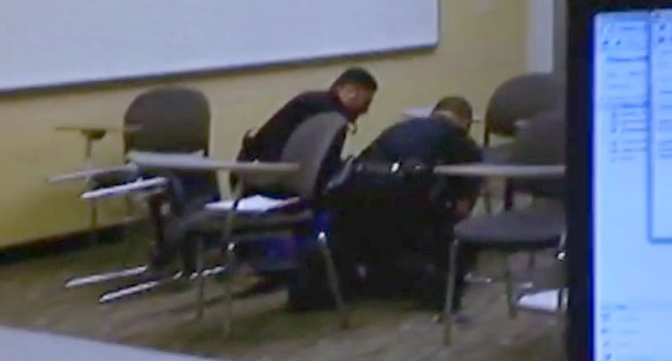 Illinois cops tackle college student in her desk because she smoked a cigarette outside