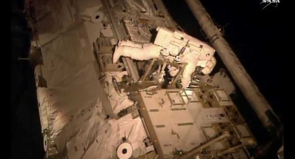US astronauts dodge ammonia on risky spacewalk