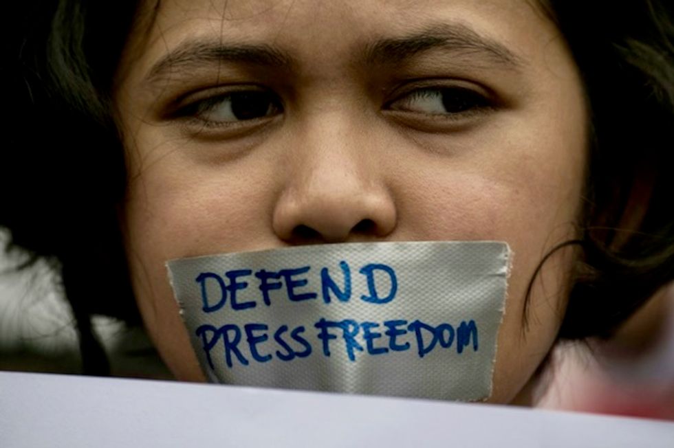 Trump, Russia and China media attacks 'threaten democracy'