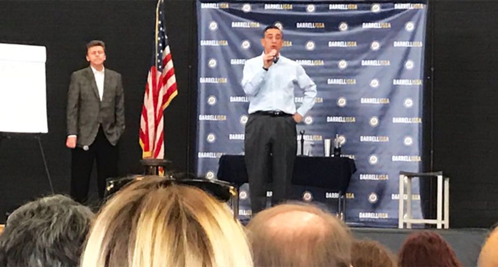 WATCH: Rep. Darrell Issa mocks woman at town hall who claims she was 'battered' by one of his staffers