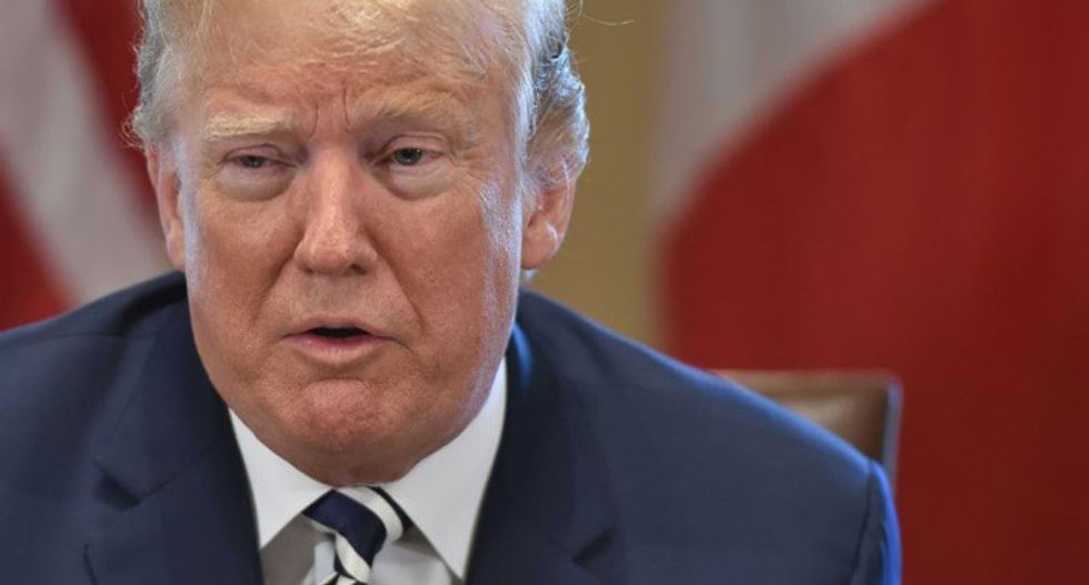 Trump opens NATO summit with fact-free breakfast rant against Germany
