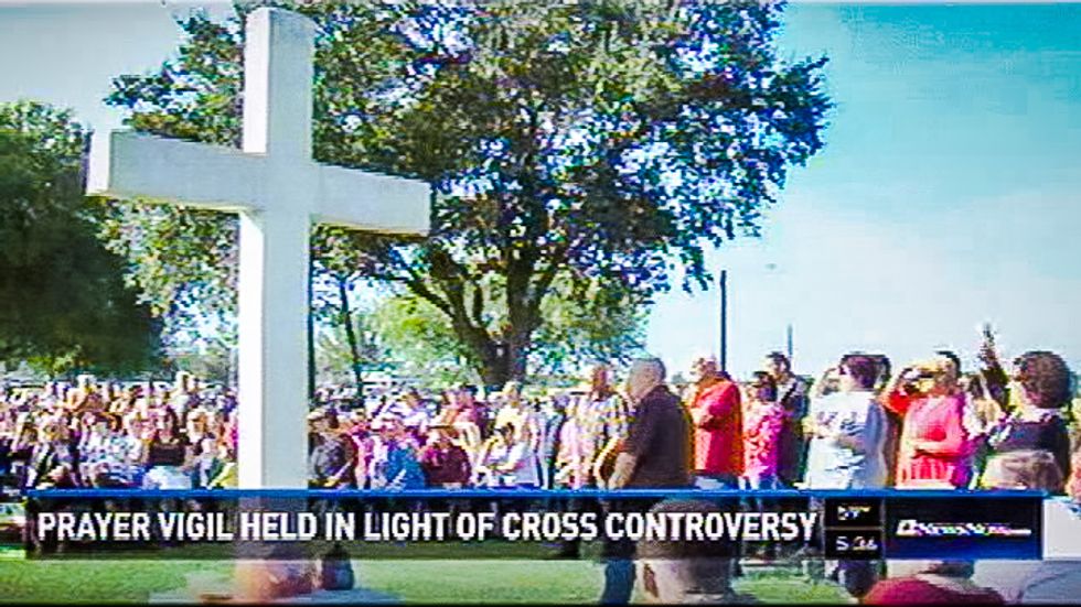 Christians at Texans prayer vigil rip up atheists' plea for 'amicable solution' to city park cross