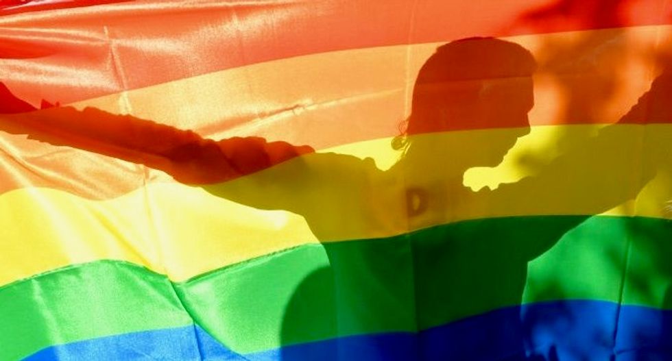 Taiwan lesbian ordered to pay back groom