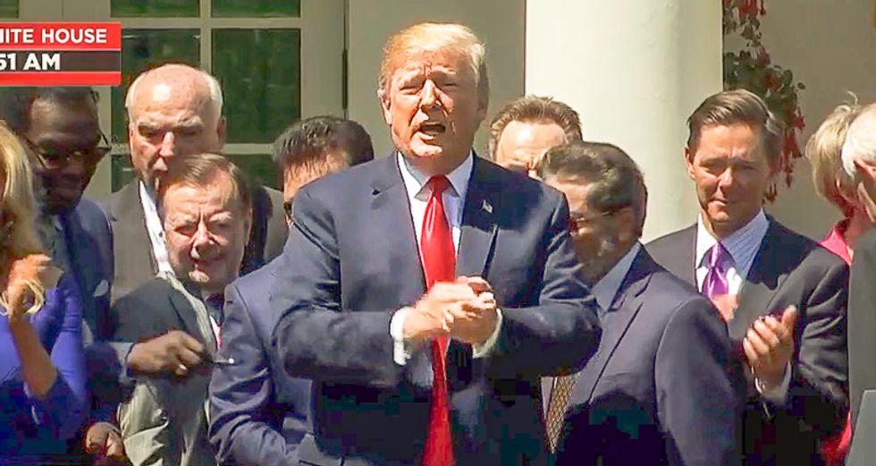 'Shame!' National Prayer Breakfast crowd shouts down NBC reporter for asking about Trump's Stormy Daniels lies