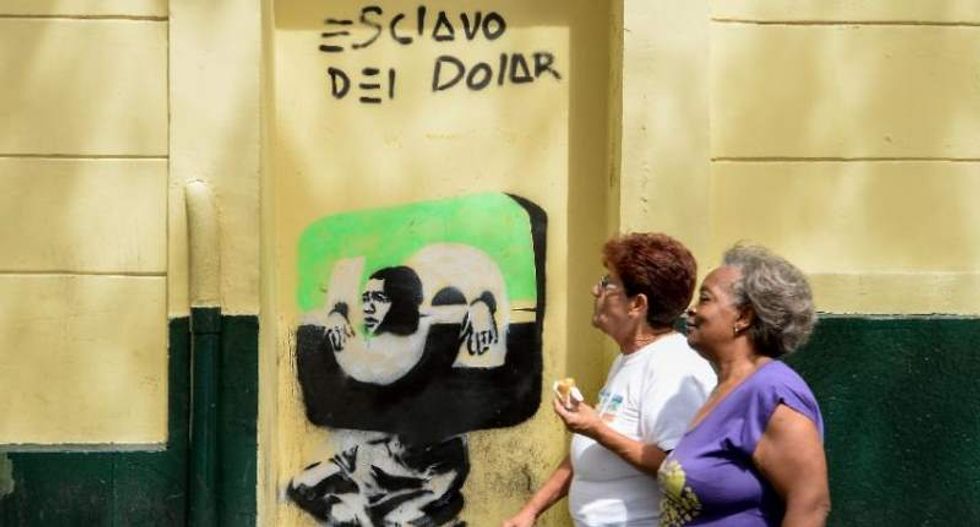 Global oil slump threatens Venezuela's vision of '21st-century socialism'