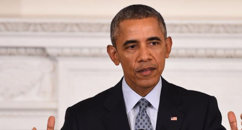 Obama vows to tackle 'unfinished business' of gun violence in 2016