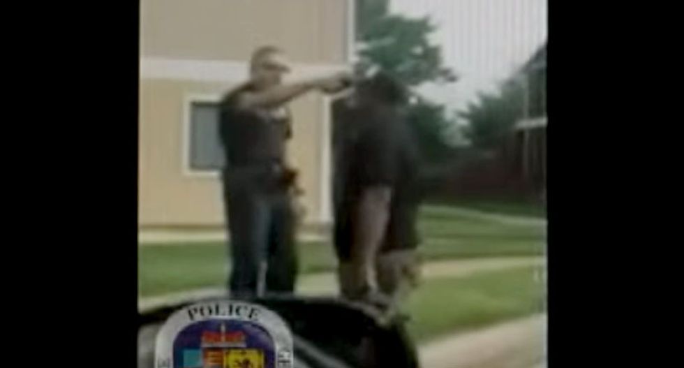 Shocking video shows power tripping cop shoving his gun into innocent black man's face