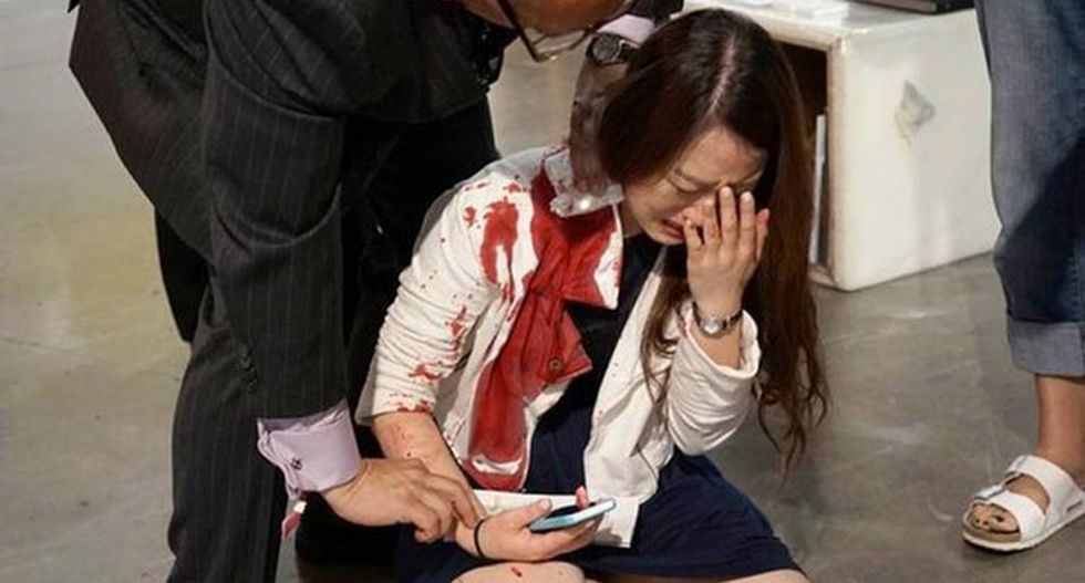Woman stabbed at Florida art exhibition as bystanders stood by thinking it was performance art