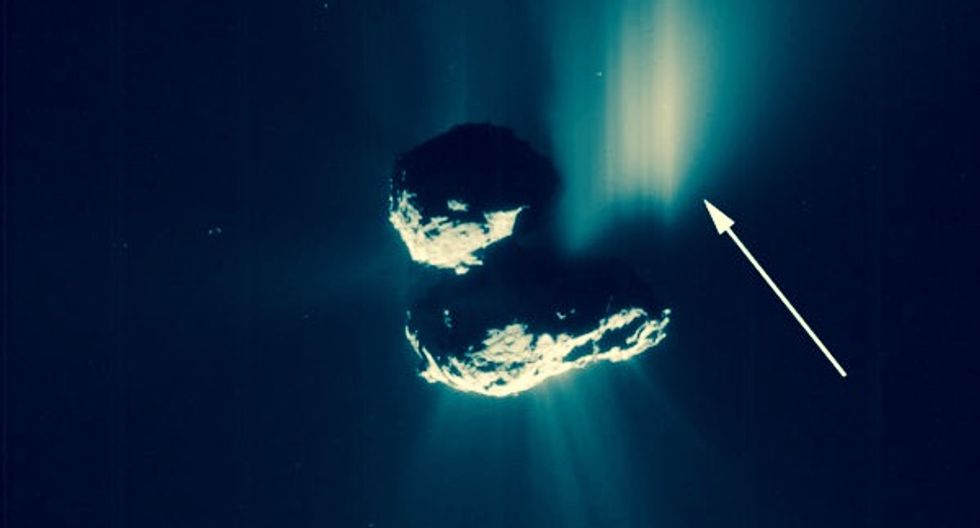 A giant cliff collapse on a comet reveals pristine ice beneath the surface