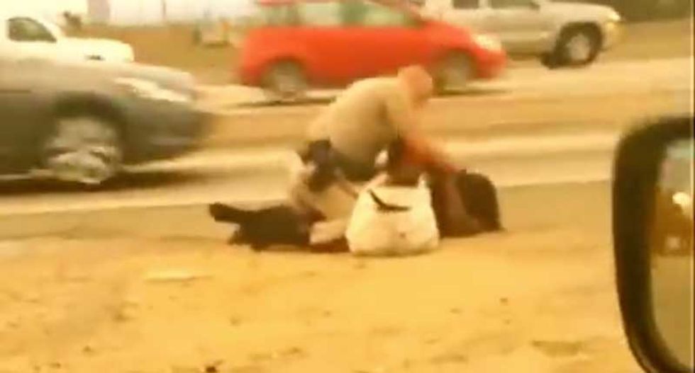 Cop escapes charges for bashing in woman's face -- because he was 'protecting' her