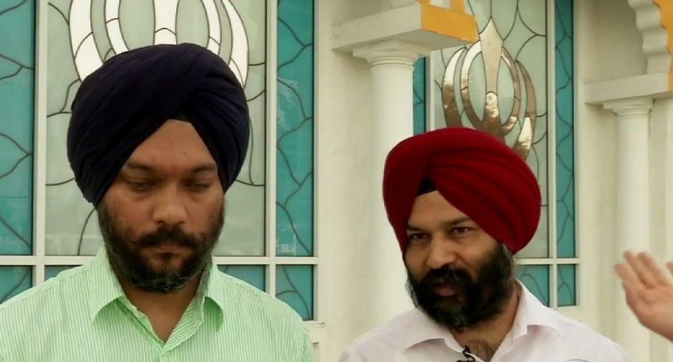 Sikhs post sign reminding bigots they aren't Muslims in the wake of anti-Muslim backlash