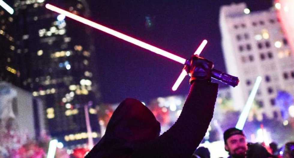 'Star Wars' roars back to box office with record-breaking $120 million opening-day haul