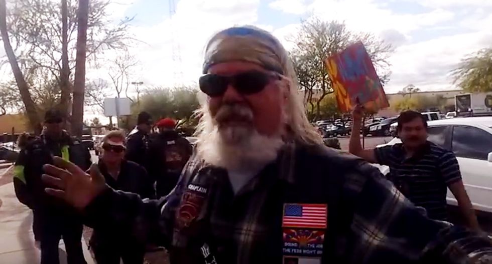 Brawl breaks out between flag-waving nativists and Hispanic protesters in Phoenix Walmart parking lot