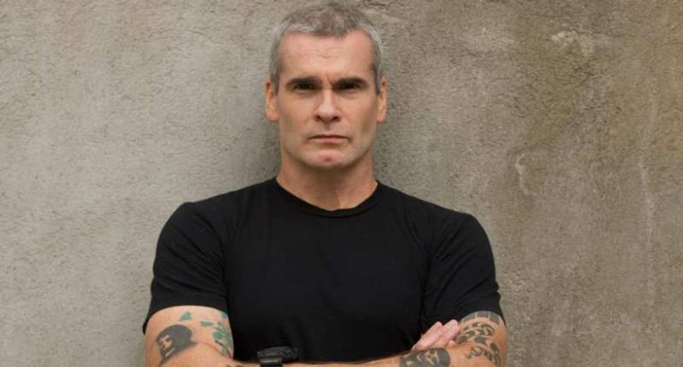 Henry Rollins rips media for featuring 'piece of sh*t' Giuliani after police shootings