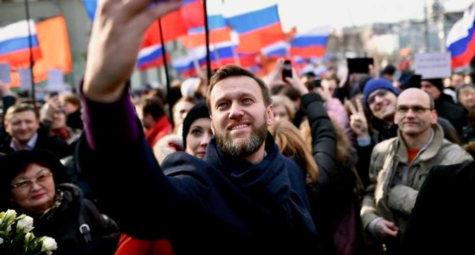 Putin critic Alexei Navalny in intensive care after 'poisoning'