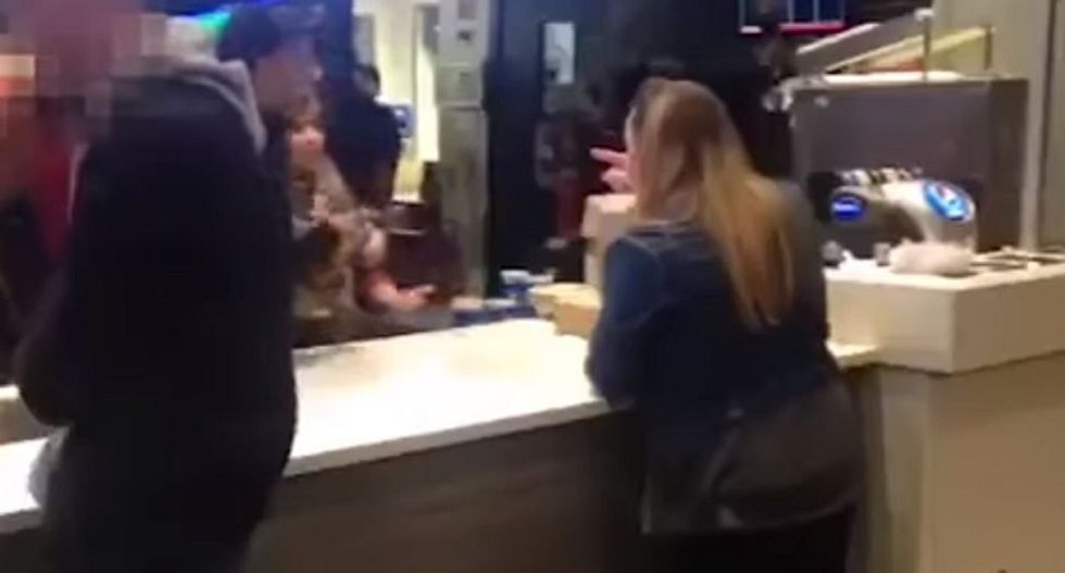 Enraged woman caught on video going bonkers inside KFC: 'You little black b*tch, I'll kill you!'