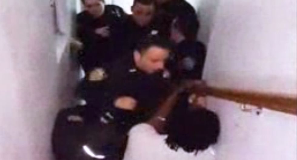 WATCH: NYC cops beat up black man inside his own home for walking his dog off leash