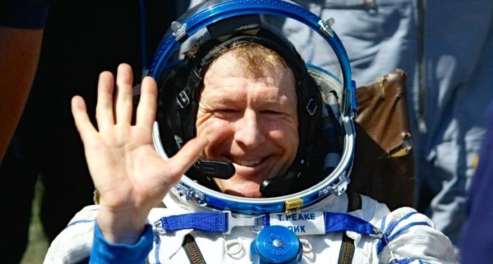 Three astronauts touch down after 6 months in space