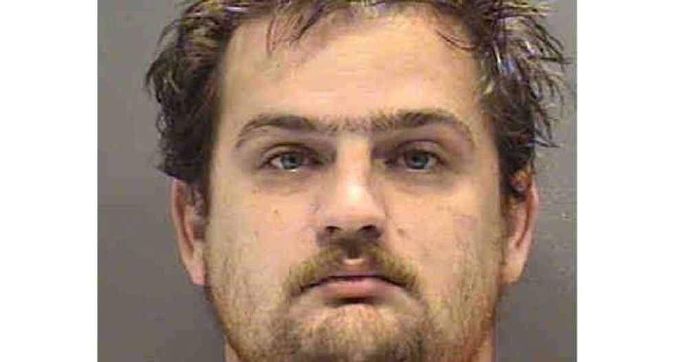 Florida man fatally smothers young son while playing video game -- then goes out to smoke