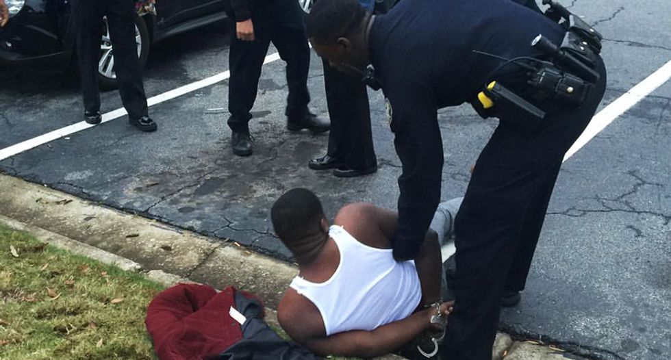 Atlanta police stop and put gun to head of rapper after he withdraws $200,000 from his bank