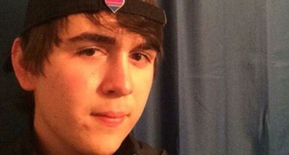 'Born to kill' Texas shooter a quiet teenager in trench coat