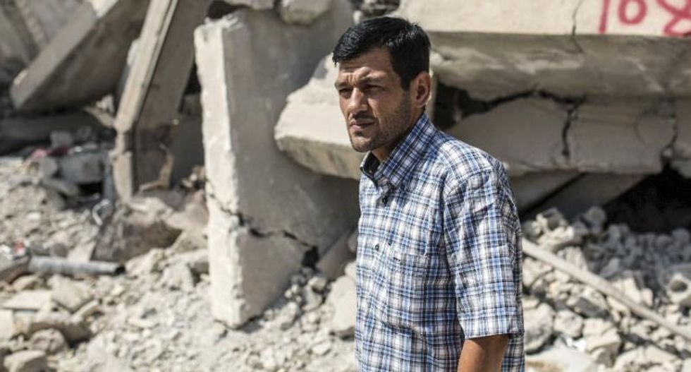 Drowned Syrian toddler's father wept over anti-refugee Charlie Hebdo cartoon