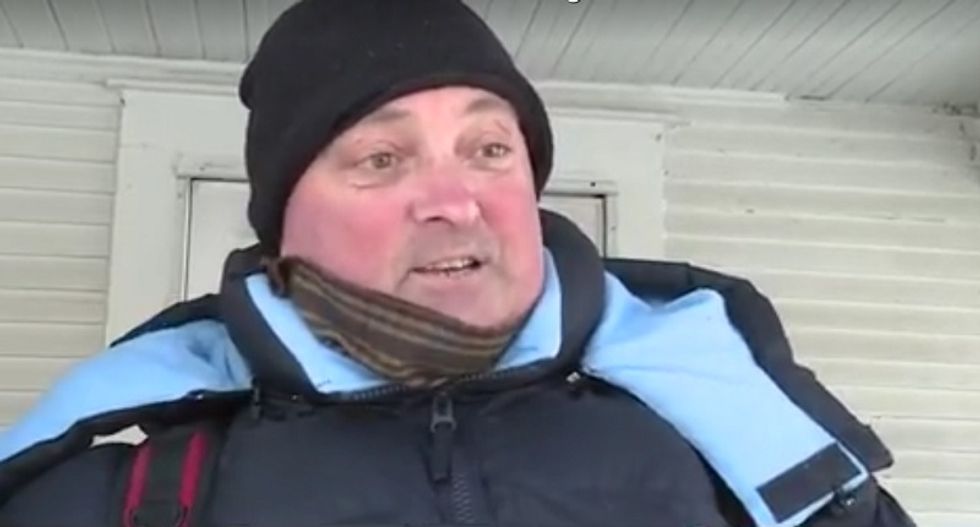 WATCH: Black reporter forces Trump supporter to admit his ’n****r Obama’ poster is ‘a little racist’