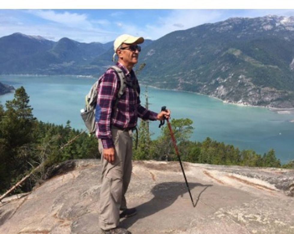 Son of dead environmentalist in Iran says family threatened