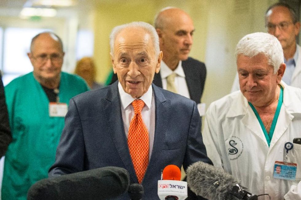 Israel's Shimon Peres hospitalised for 'irregular heartbeat': office