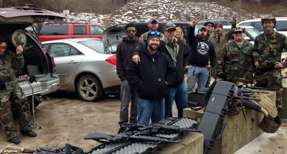 Michigan militia vows to 'take up arms' to defend Flint residents in fight with state over poisoned water