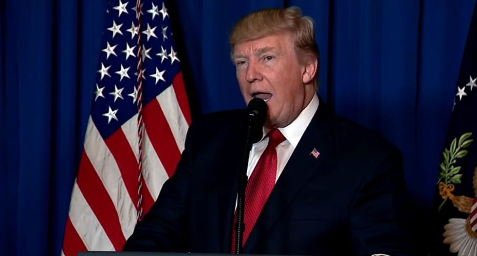 Trump presses a red button affixed to the Oval Office desk when he wants a butler to bring him a Coke