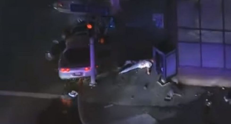 Fired Los Angeles police who killed unarmed National Guardsman on live television sue to get their jobs back