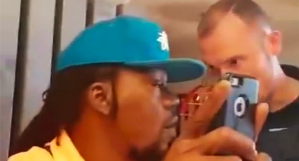 WATCH: Black tourists booted by police from KFC after manager complained they were 'too loud'