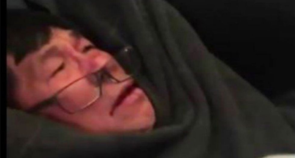 Cop who bloodied United passenger suspended pending 'thorough review of situation'