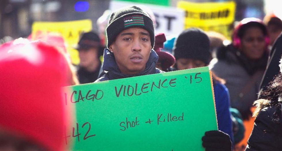 White Chicago cop to sue estate of black teen he killed