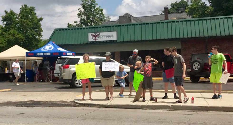 WATCH: Noblesville shooting survivors protest NRA recruiters after they set up tent following Friday school attack
