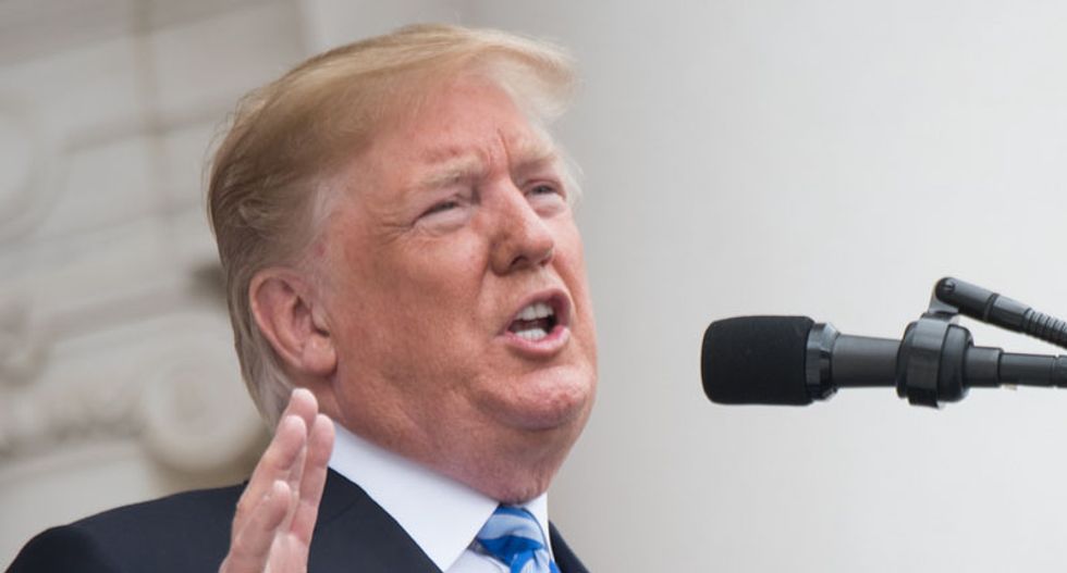 Trump says he is considering 3,000 pardons -- including boxing legend Muhammad Ali