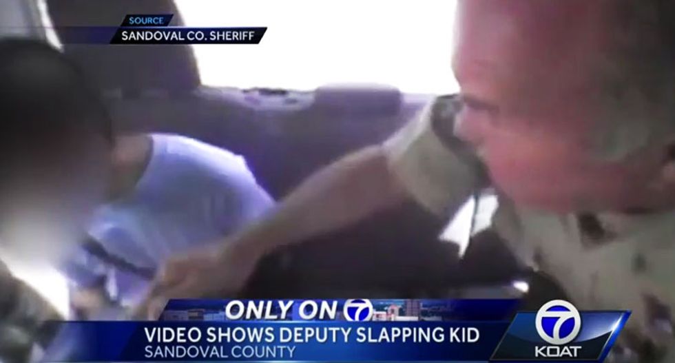 New Mexico sheriff's deputy charged after video shows him repeatedly slapping restrained teen