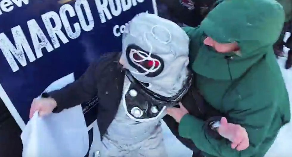 WATCH: Rubio supporter greets candidate after violently assaulting protester dressed as robot