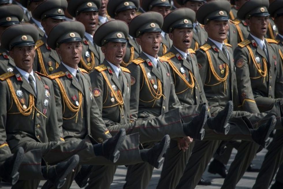 'Prepared to respond': North Korea's Kim Jong-Un stages massive show of military strength