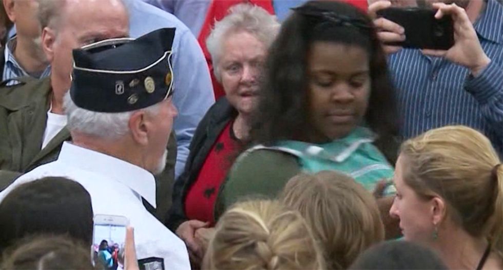Lawyers for Trump fan who attacked black woman at Kentucky rally blame Trump for 'urging' him on