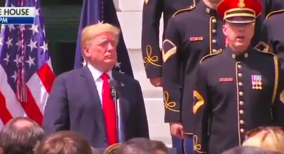 WATCH: Trump fakes his way through singing 'God Bless America' at Eagles-less White House ceremony