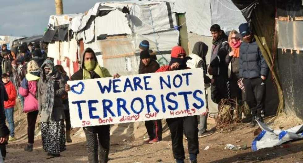 French police clash with immigrants during demolition of 'Jungle' encampment