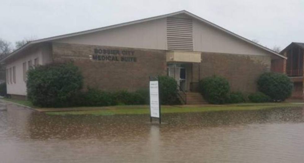 Anti-abortion group cheers as flood waters threaten Louisiana abortion provider