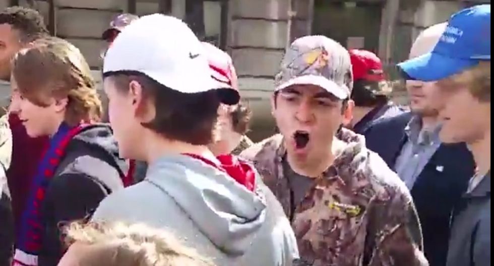 ‘F*ck you, you whore!’: Watch angry white people go berserk outside Trump rally in St. Louis