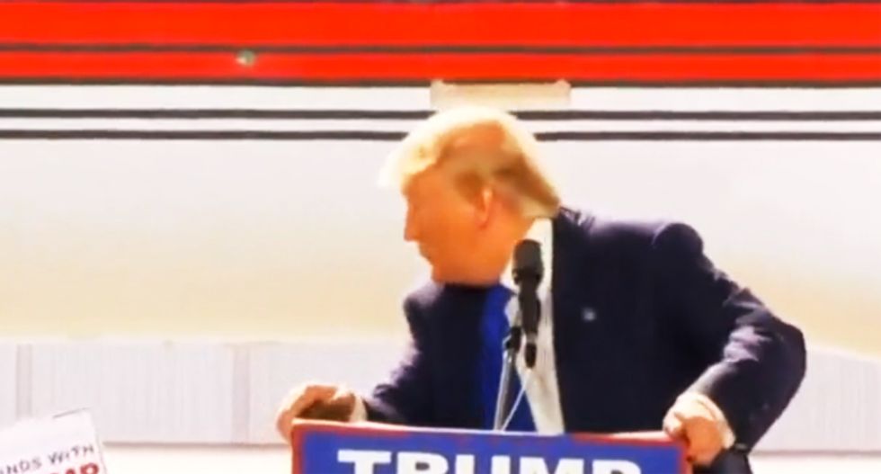 WATCH: Donald Trump panics as Secret Service rush the stage to stop Dayton protester