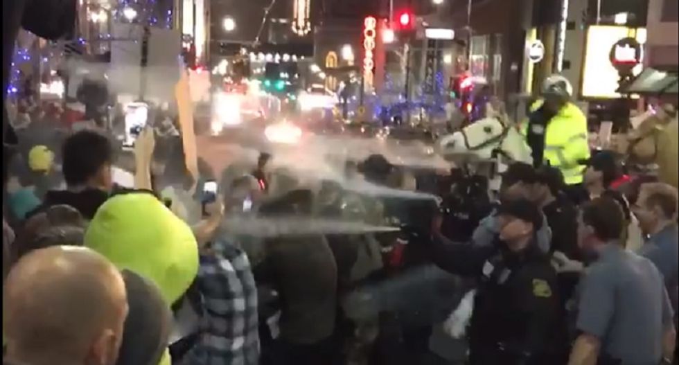 WATCH: Kansas City police unleash pepper spray on demonstrators outside another chaotic Trump rally