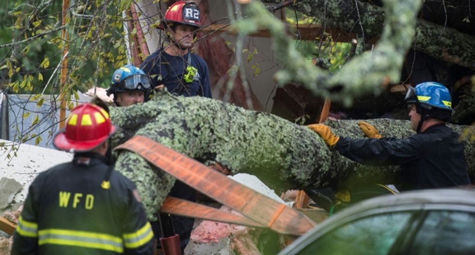 Several dead, hundreds rescued as Hurricane Florence pounds Carolinas