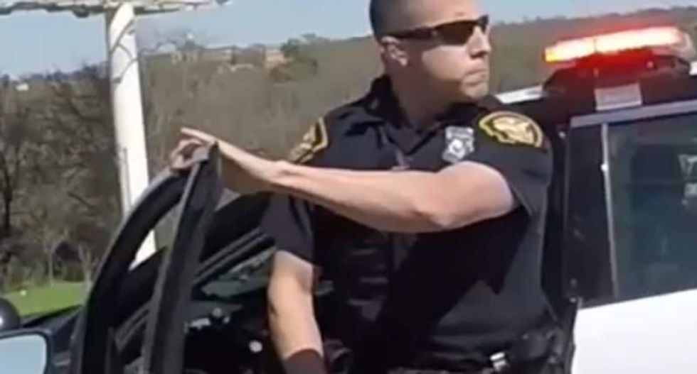 Texas cop under investigation after video shows him pepper-spraying bikers for no reason