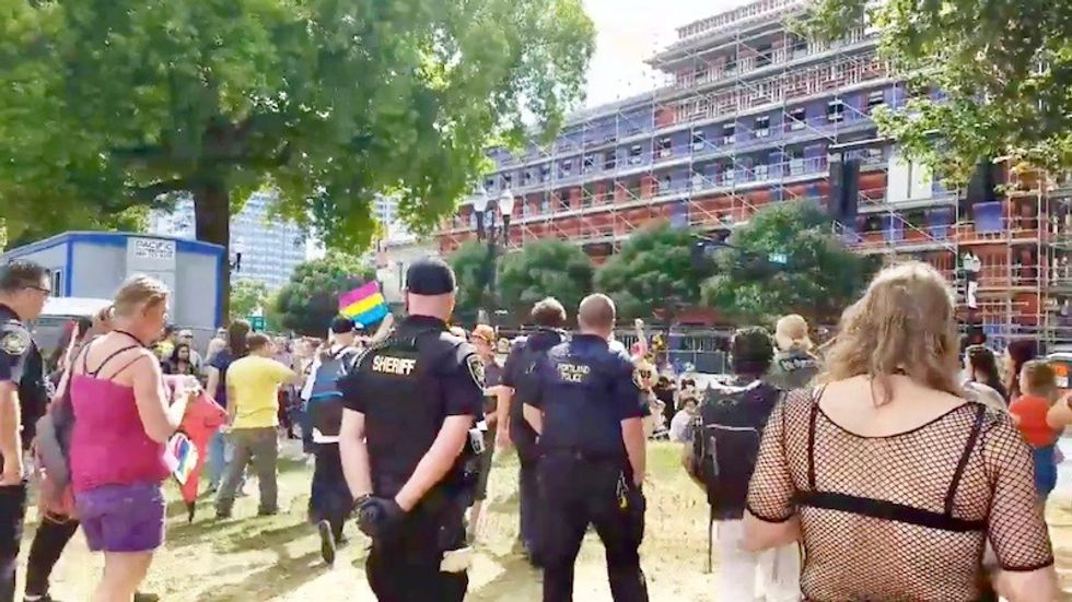 Cops force anti-gay protestors away from Portland Pride parade after reported tear gassing